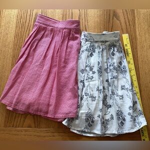 2 lined flared skirts